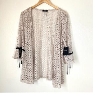 Onyx Tan Laced Jacket w/Black Trim . Sz XL.